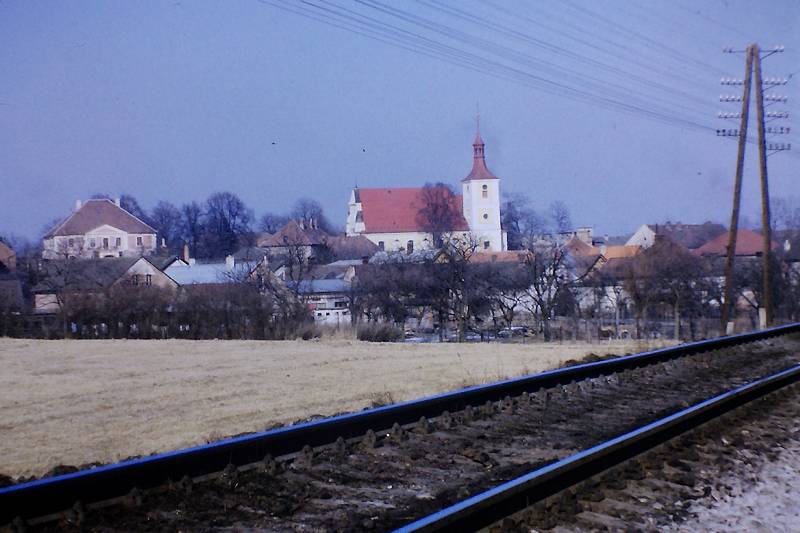 město