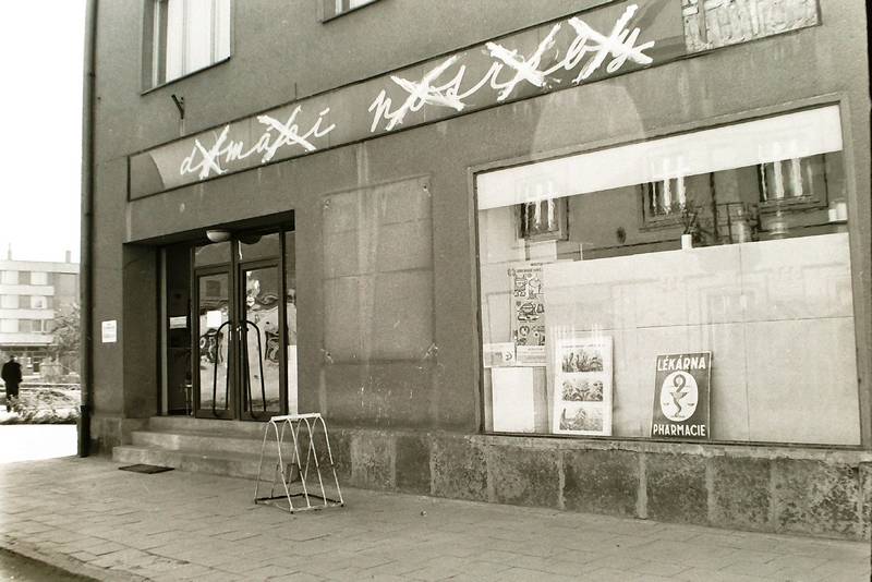 město